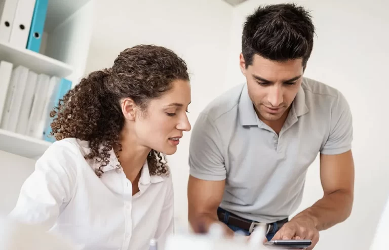 Accounting employees discussing on a project